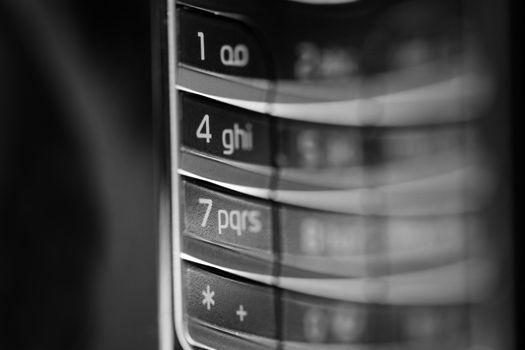 An almost abstract image of a cell phone keypad.