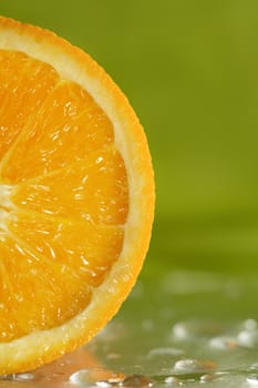 Orange Fruit on wet surface.