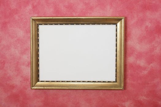 Old photo frame on red background