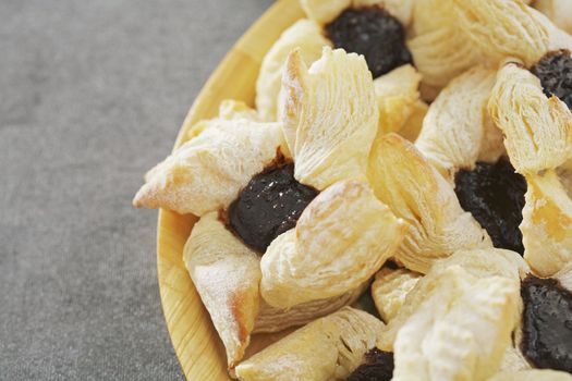 Star shaped puff pastries with plum marmalade, eaten at christmas time in Finland