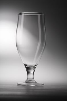 Empty footed beer glass