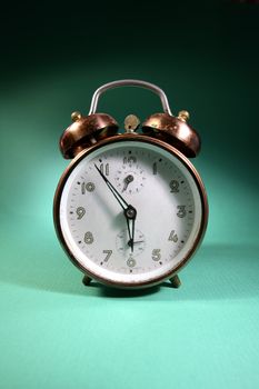 Vintage alarm clock is almost six