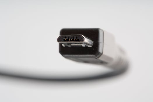 New Micro-USB connector, the new (2007) standard for cell phones.