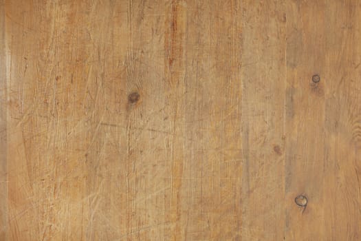 Hi-res background image of scratched and worn wood