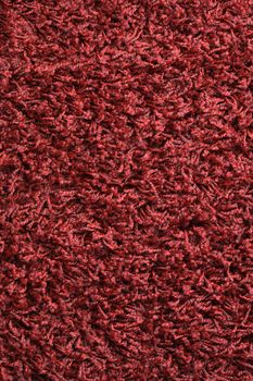 Red fuzzy rug in closeup