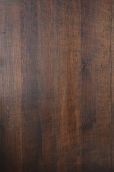 Hi-res dark brown scratched and worn wooden background