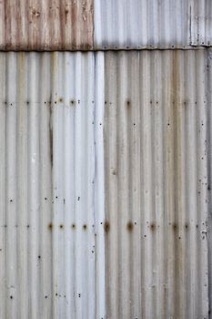 Ugly corrugated iron metal background texture.