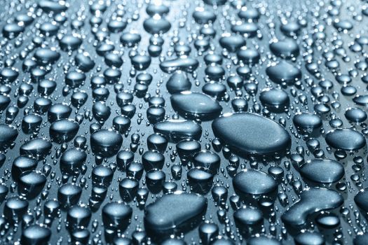 Droplets on a metallic blue car