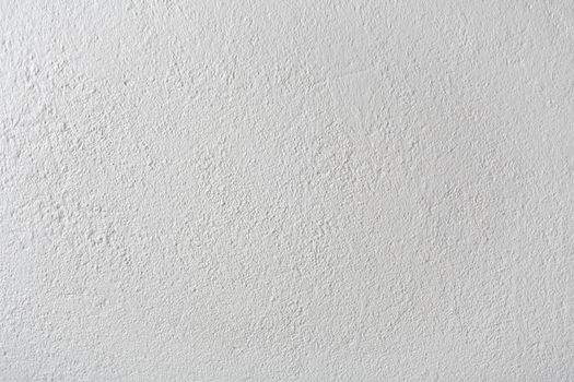 light grey painted stucco concrete wall