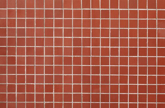 Red tile on an outer wall of a building