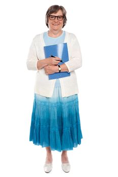 Full length portrait of cheerful lady holding office stationery