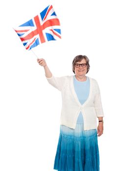Senior lady holding UK flag and waving isolated on white