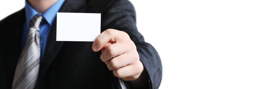 Businessman holding his business card in hand