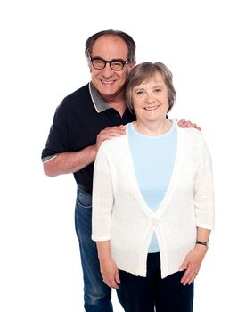 Portrait of smiling aged couple in love isolated over white background