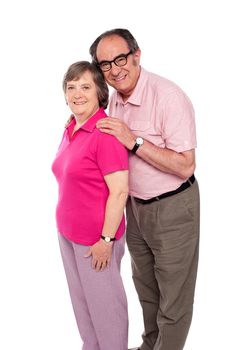 Portrait of happy senior couple. Man resting his hands on wife