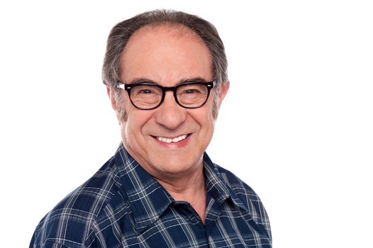 Closeup portrait of senior old man smiling in front of camera