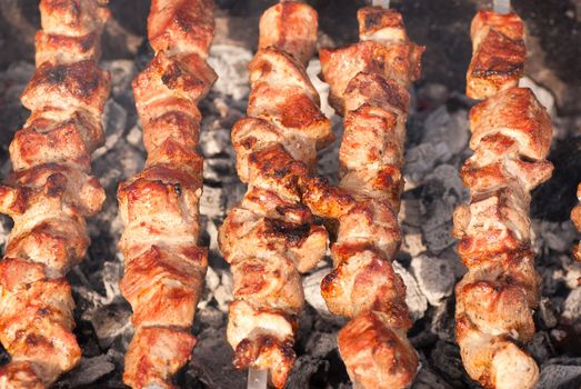 Steak and other meat on barbeque. Background. Smoke. Meals, Close-up