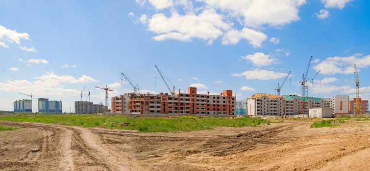 Building panorama on blue cloudy sky