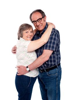 Husband and wife hugging each other isolated against white background