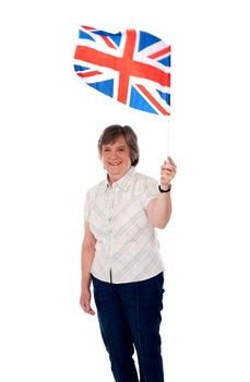Aged lady with a union jack isolated over white background