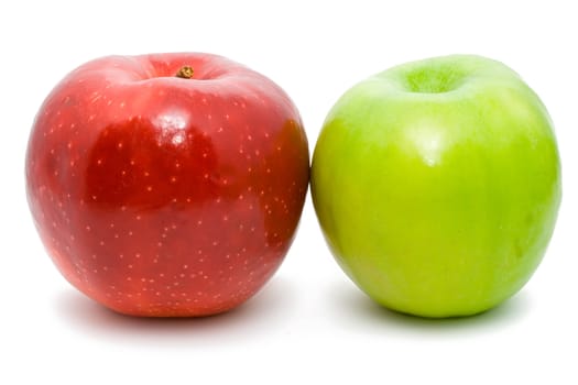 Red and green apples on white