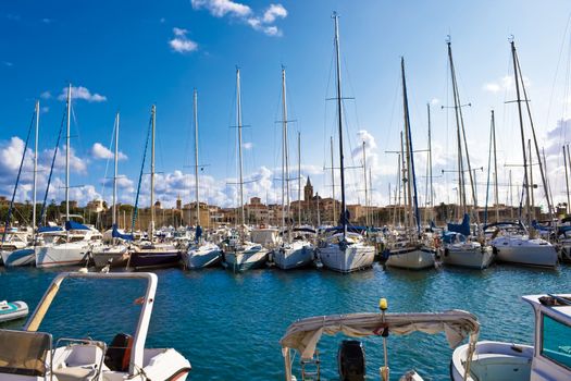 Classic white yachts ancored in Alghero, Sardinia