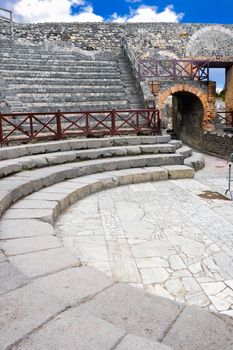 Ancient ruins of a small amphitheater in Pompeii, Italy