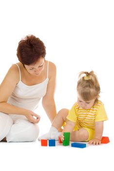 Small girl build pyramid with mother isolated