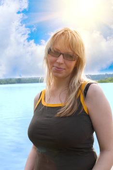 Pretty Girl relaxing portrait  at blue sea
