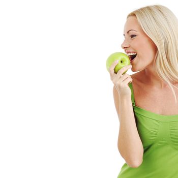 blond woman eat green apple on white