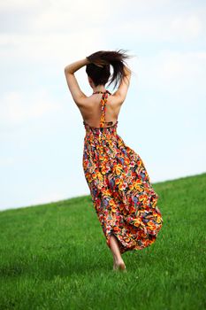 happy woman on green grass 