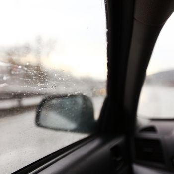 drive on rain window in drops