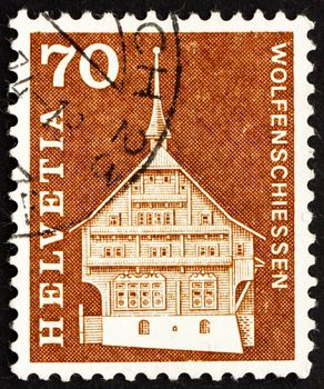 SWITZERLAND - CIRCA 1967: a stamp printed in the Switzerland shows Lussy House, Wolfenschiessen, Switzerland, circa 1967