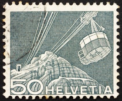 SWITZERLAND - CIRCA 1949: a stamp printed in the Switzerland shows Cable Car, circa 1949