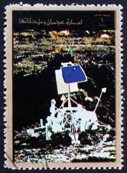 AJMAN - CIRCA 1973: a stamp printed in the Ajman shows Lunar Probe, Space Exploration Program, circa 1973
