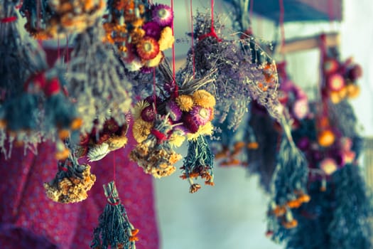 flowers bouquets drying on the ceiling