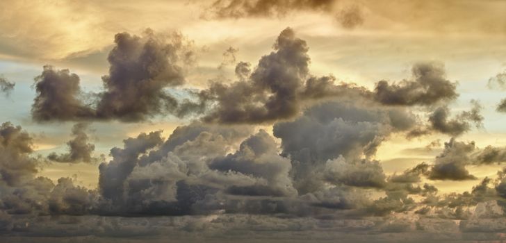 Dark storm clouds in evening sky - panorama