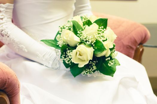 beautiful bouquet of the bride executed from light beige roses