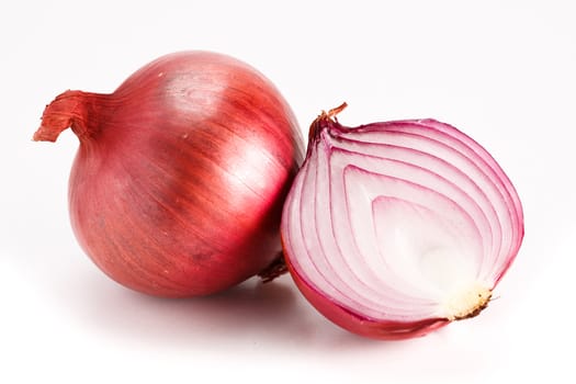 Close-up of vibrant delicious fresh red onions. Isolated on white.