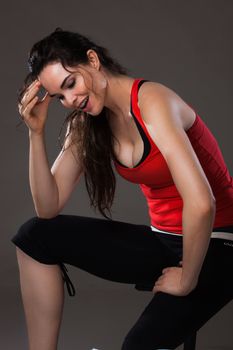 A beautiful sexy woman having a rest from her exercise