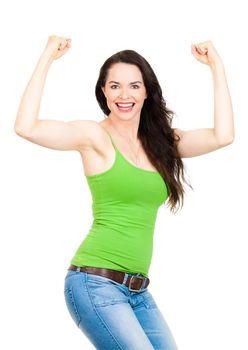 A happy beautiful fit woman felxing her muscles and smiling. Isolated over white.