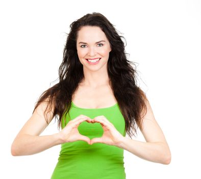 Beautiful young woman symboling a love heart with hands. Isolated over white.