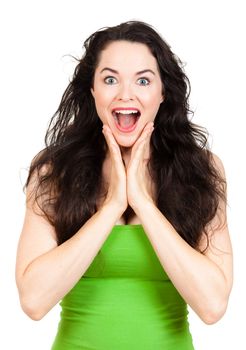 A happy and  surprised beautiful woman looking at camera. Isolated on white.