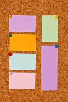 papers on cork board