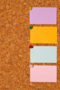 papers on cork board