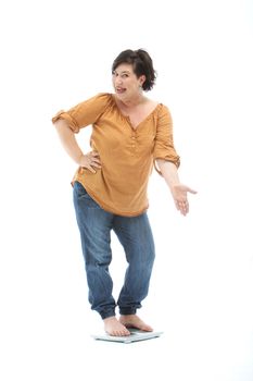 Successful Diet - Woman on a Scale is proud - cutout on white
