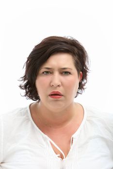 Woman looks stupid and questioning - cutout on white