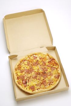 Pizza in a cardboard box