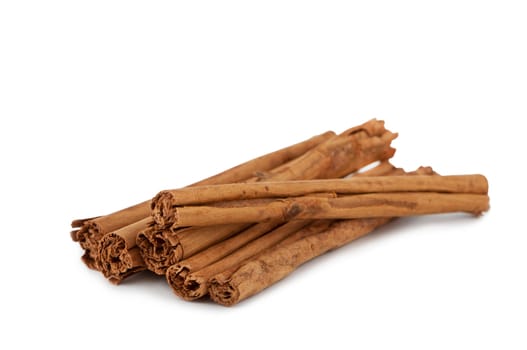 Cinnamon sticks isolated on white background.