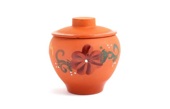 Orange clay pot with a pattern for meal preparation